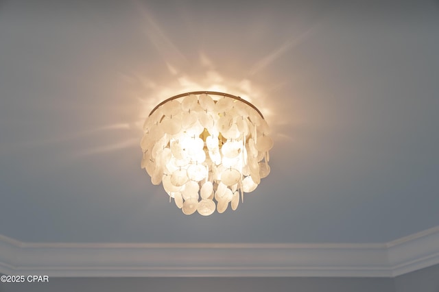 details featuring an inviting chandelier