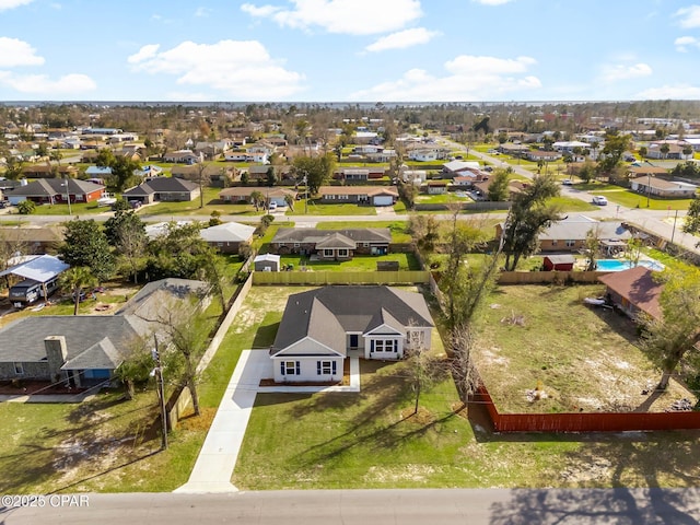 birds eye view of property with a residential view