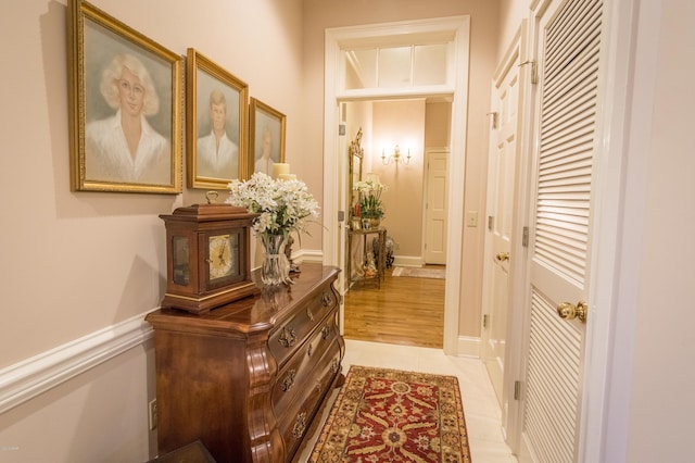 corridor with light tile patterned flooring