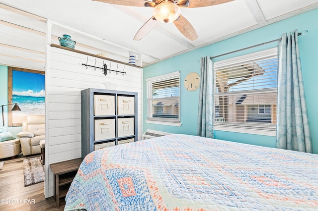 bedroom featuring wood finished floors and a ceiling fan