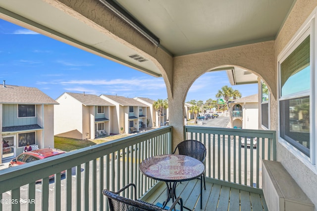 balcony featuring a residential view