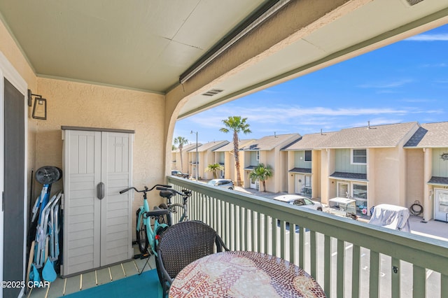 balcony featuring a residential view