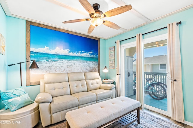 living area with ceiling fan