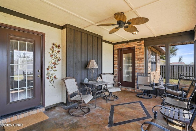 view of patio / terrace featuring fence and a ceiling fan