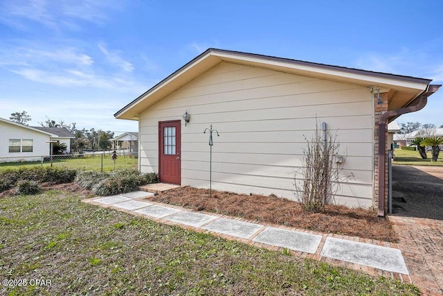 view of outdoor structure with fence