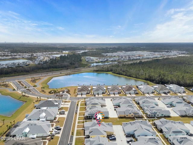 aerial view with a water view and a residential view