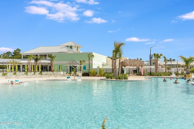 pool with fence and a gazebo