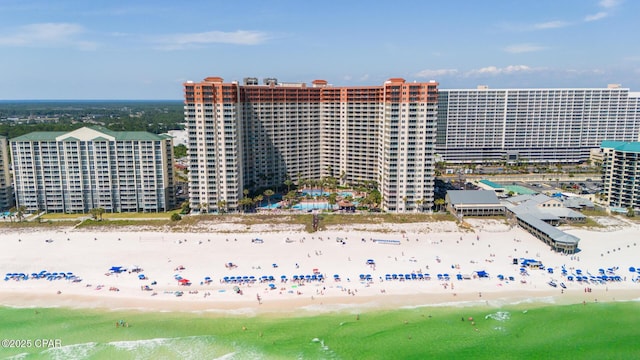 bird's eye view with a city view, a beach view, and a water view