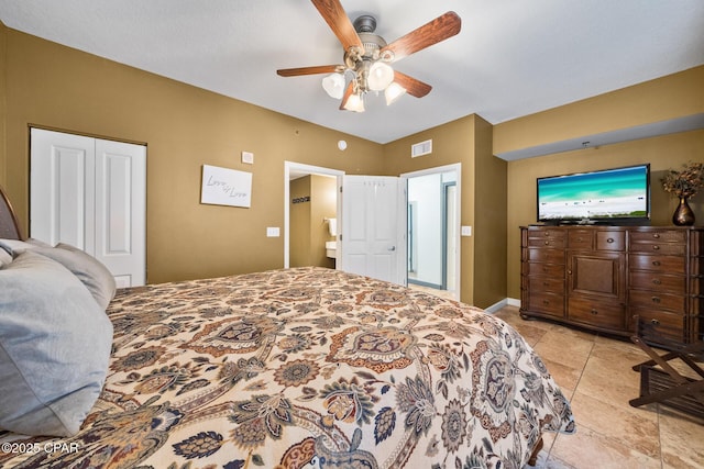 bedroom with light tile patterned flooring, a ceiling fan, visible vents, and baseboards