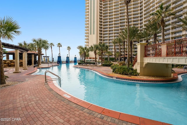 community pool featuring a patio area