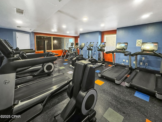 exercise room with visible vents and recessed lighting