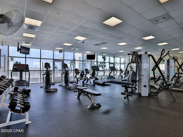 1160 Scenic Gulf Dr Unit A903, Miramar Beach, FL 32550 - exercise room featuring visible vents, a drop ceiling, and a healthy amount of sunlight
