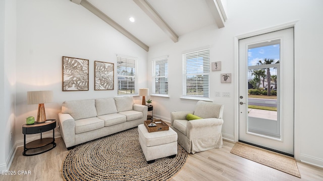 living room featuring light wood-style floors, recessed lighting, lofted ceiling with beams, and baseboards