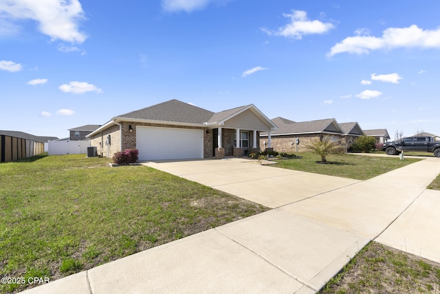 ranch-style home with a garage, a front yard, concrete driveway, and brick siding