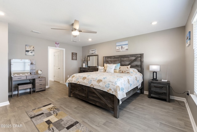110 Spikes Cir, Southport, FL 32409 - bedroom with baseboards, light wood-type flooring, recessed lighting, and ceiling fan