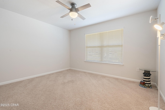 110 Spikes Cir, Southport, FL 32409 - empty room featuring carpet floors, ceiling fan, and baseboards