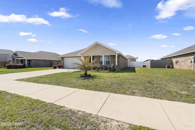 view of front facade with brick siding, concrete driveway, an attached garage, fence, and a front lawn