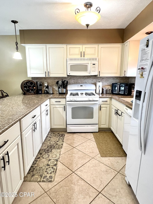 kitchen featuring light tile patterned floors, white appliances, white cabinets, tasteful backsplash, and decorative light fixtures