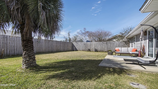 view of yard with a patio and a fenced backyard