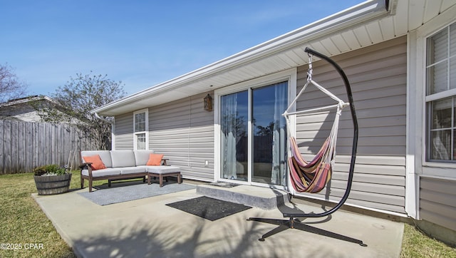 view of patio / terrace featuring fence and an outdoor living space