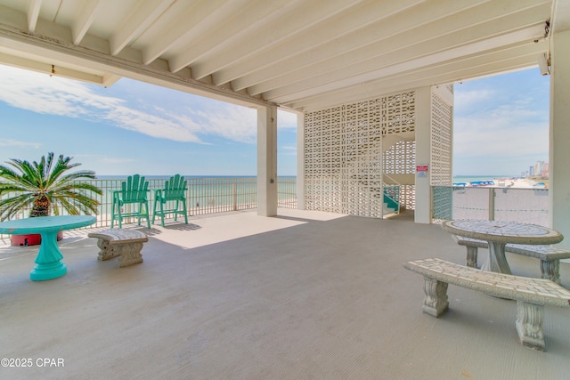 view of patio / terrace with a water view