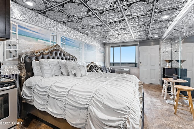 bedroom featuring cooling unit and an ornate ceiling