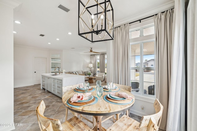 dining space featuring recessed lighting, baseboards, visible vents, and ornamental molding