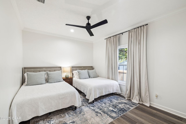 bedroom featuring recessed lighting, a ceiling fan, baseboards, ornamental molding, and dark wood-style floors