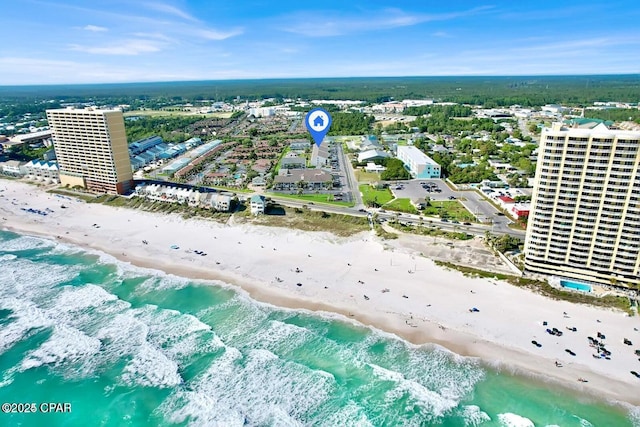 aerial view with a water view, a city view, and a view of the beach