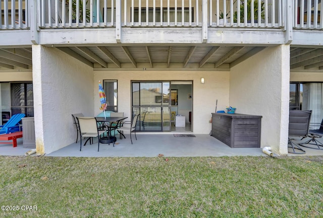 view of patio with a balcony