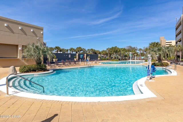 pool featuring a patio area