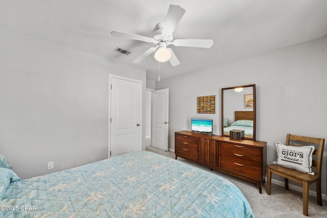 bedroom featuring baseboards, ceiling fan, visible vents, and carpet flooring