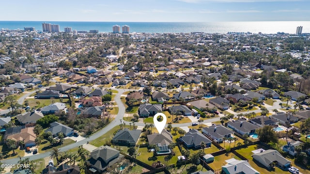 bird's eye view with a water view and a residential view