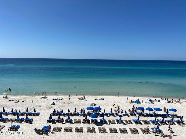 view of water feature with a beach view