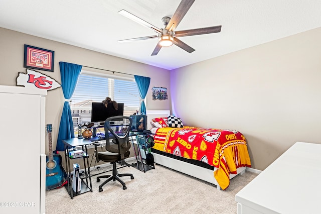 bedroom featuring baseboards, carpet floors, and ceiling fan