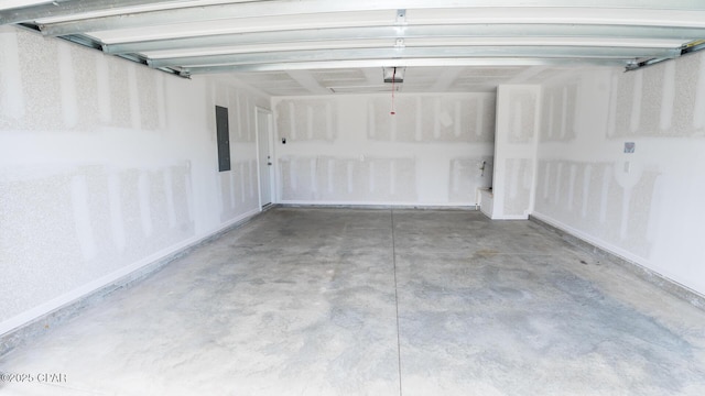 garage with electric panel and a garage door opener