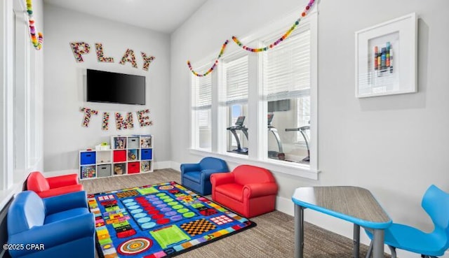 game room featuring baseboards