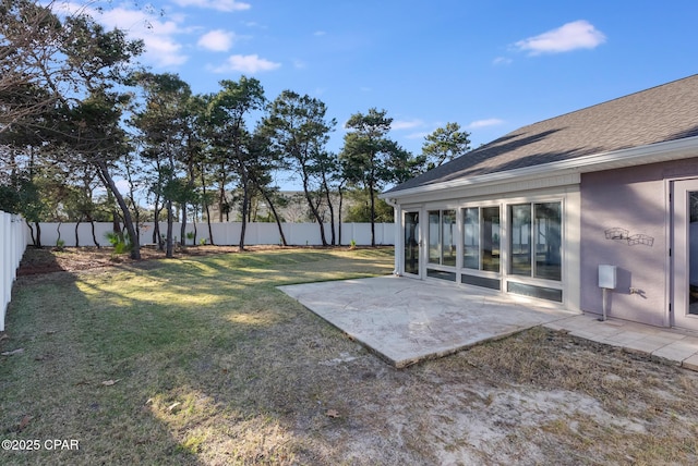 view of yard with a patio area and a fenced backyard