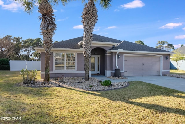 single story home featuring driveway, an attached garage, fence, and a front yard