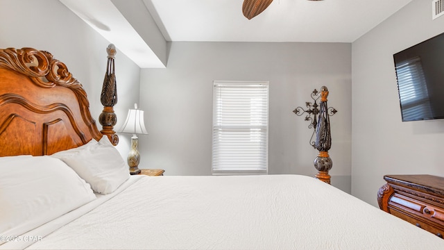 bedroom featuring visible vents and ceiling fan