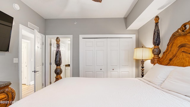 bedroom featuring a closet and a ceiling fan