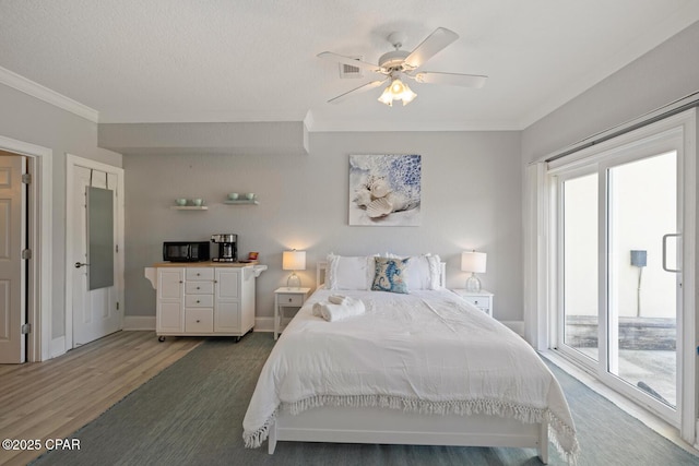 bedroom with light wood-style flooring, multiple windows, and crown molding