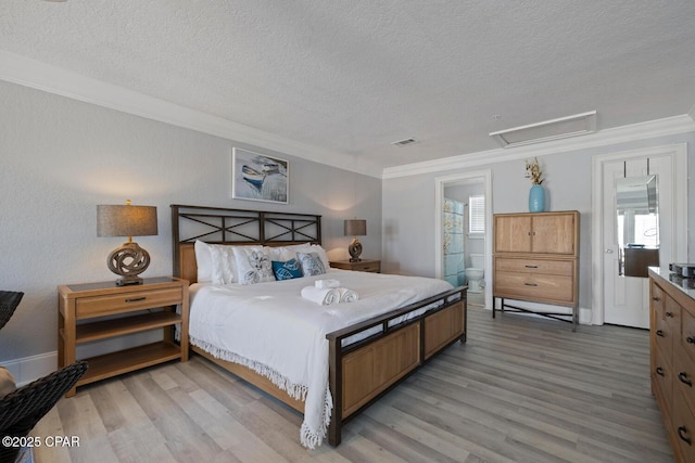 bedroom featuring visible vents, crown molding, a textured ceiling, and light wood-type flooring