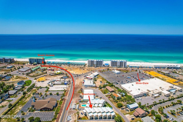 bird's eye view featuring a city view and a water view