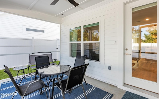 view of patio / terrace with outdoor dining area and a ceiling fan