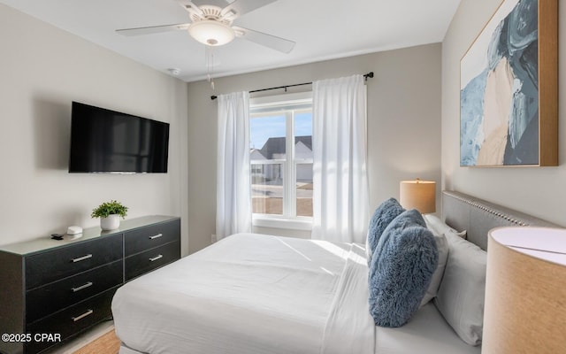 bedroom featuring ceiling fan