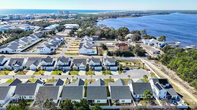 aerial view with a water view and a residential view