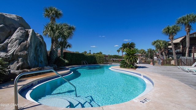 pool featuring fence