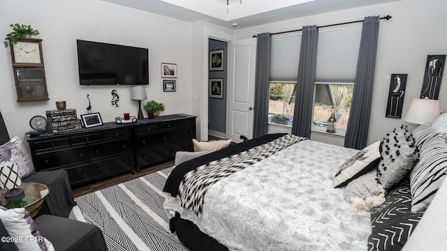 bedroom with wood finished floors