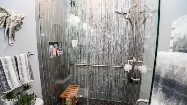 bathroom with a shower stall